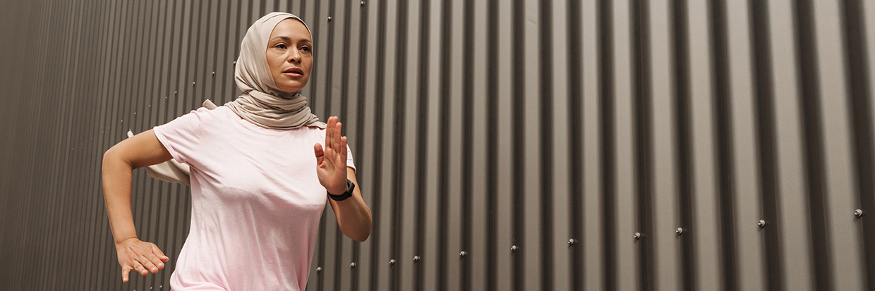 mid-aged-muslim-woman-in-hijab-exercising-outdoors-2023-11-27-05-08-24-utc.jpg